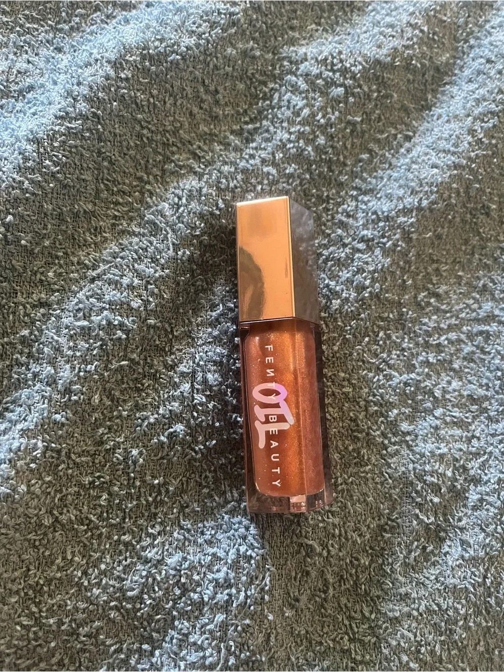Fenty Beauty Shimmering Copper-Bronze Lip Gloss